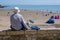 People on Sunny sands beach enjoying the beautiful sunshine