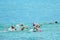 People swim the swimming stage of Raratonga triathlon contest Co