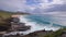 People swim in the turquoise waters of the Tropical Beach. Sandy Beach. Blue Waves of the Pacific Ocean Beats Oahu