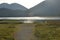 people swimming at nature reserve lake Weitsee, bavarian alps