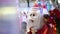 People take photo with santa claus mascot