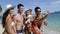 People Take Selfie Photo On Cell Smart Phone On Beach, Happy Smiling Young Tourists Group On Vacation