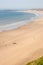 People taking beach time at Rhossili bay, Gower, Wales