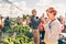 People taking photos with their mobiles on the rooftop of Tampere Talo