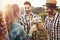 People tasting wine in vineyard