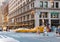 People and taxis in the intersection of Fifth Avenue and 23rd in New York City