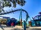 People with their hands in the air on the Mako Roller Coaster at SeaWorld