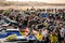 People with their rally raid cars and buggies lined up on the beach of agadir at the start of the Morocco Desert Challenge