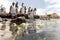 People on top of a rock offering gifts to Iemanja