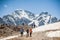 People - tourists and climbers resting on top of Mount Cheget