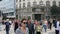 People and Tourists cross the road at traffic light in Belgrede city center