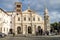 People tourists have a rest during the tour of the island Tiberina in the square near the church of St. Bartholomeo in Rome, capit