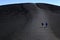 People Tourists Hiking on Inferno Cone at Craters of the Moon National Monument