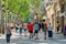 People and tourists walking on one of the most important avenues in downtown Barcelona city