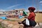 People trades traditional souvenirs in Chinchero, Peru