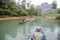 People traveling in a canoe on the river