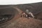 People trekking on Etna volcano, Sicily.