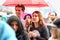 People with umbrellas watching a concert under the rain at Heineken Primavera Sound 2014 Festival