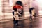 People under umbrella walking in the rain.