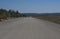 People using former soviet army military airport for having fun on in-line skates. Czech Republic, Ralsko. Springtime