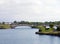 People on the venetian bridge crossing the lake in the kings gardens in southport merseyside