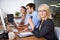 These people are the very meaning of teamwork. Three young businesspeople sitting at a table in an office.