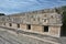 People viewing of the nunnery building in Uxmal. Yucatan Peninsula, Mexico.