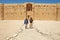 People visit desert castle Qasr Kharana Kharanah or Harrana near Amman, Jordan.