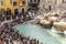 People visit the Trevi fountain in Rome. Throwing coins in the fountain should give luck to the people