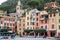 People are visiting colourfull town Portofino in Italian Liguria, Italy