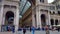 People visiting Galleria Vittorio Emanuele, famous Milan sightseeing, entrance