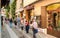 People visiting the historic center of ancient village of Orta San Giulio, located on the coast of Lake Orta in Piedmont, Italy