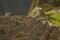 People Visiting Lost Incan City of Machu Picchu near Cusco in Peru