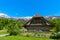 People visiting the old farm house in Ballenberg. Swiss Open Air Museum in Brienz, Switzerland