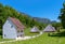 People visiting the old farm house in Ballenberg. Swiss Open Air Museum in Brienz, Switzerland