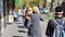 People waiting in line in front of a supermarket at a safe social distance to respect rules during coronavirus pandemic