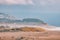 People walk along the beach at Ocean Beach, San Francisco. Pacific Ocean