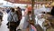 People walk along the central street of the Oktoberfest festival. Bavaria, Germany