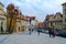 People walk along Nerudova Street in historic district of Prague Mala Strana, Czech Republic