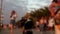 People walk along the promenade at the resort. People on a walk. Blurred view. Concept of people on the Black Sea coast.