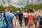 People walk along the Vinogradovsky cable-stayed bridge, in the middle is a policeman