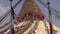 People walk around the Buddhist spiritual center Boudhanath Stupa