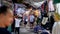 People Walk at Asian Street Clothing Night Market on Jomtien Beach. Pattaya, Thailand