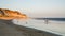 people walk on beach Praia Falesia near Albufeira