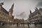 People walk in the Brussels Grand Place royal buildings and fine architecture