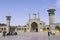 People walk in front of the Fatima Masumeh Shrine in Qom, Iran.