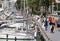 People walk next to the sea after they were allowed out to exercise for the first time in seven weeks wider