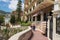 People walk by the seaside passage in the historical part of Monaco.