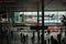 People walk in transit area at Schipol airport in Holland