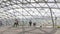 People walk under a glass dome, Moscow